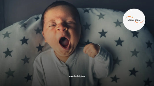 little baby yawning in his sleep