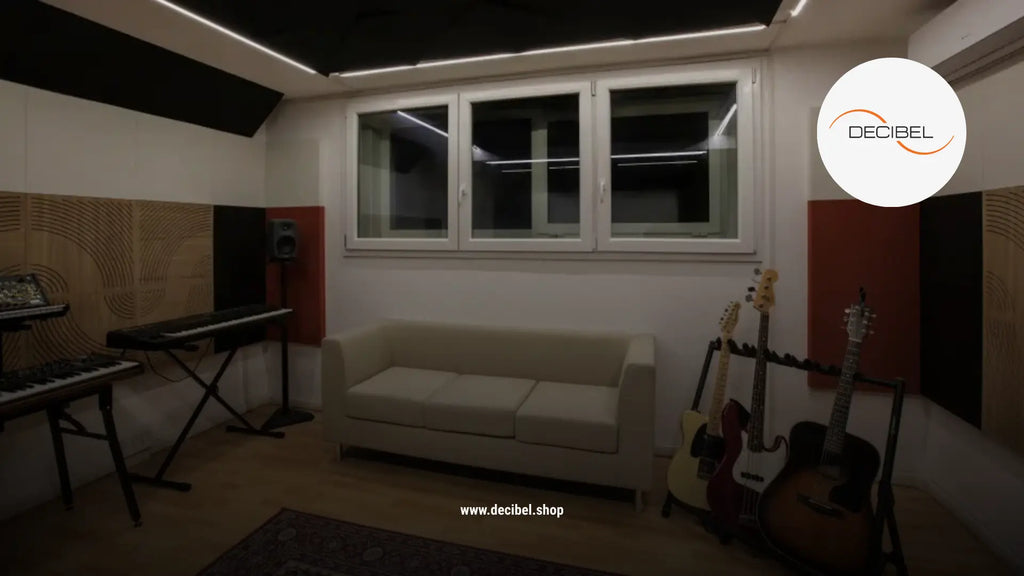 music studio at home with acoustic panels, guitars and keyboard