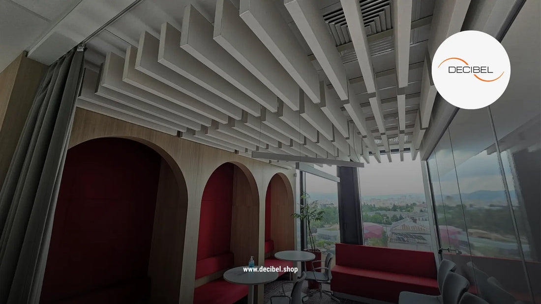 acoustic ceiling baffles in a red and white office