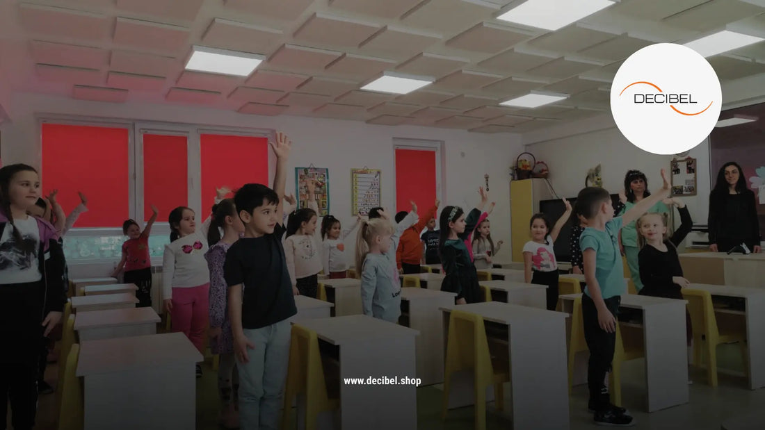 kids in a kindergarten raising hand