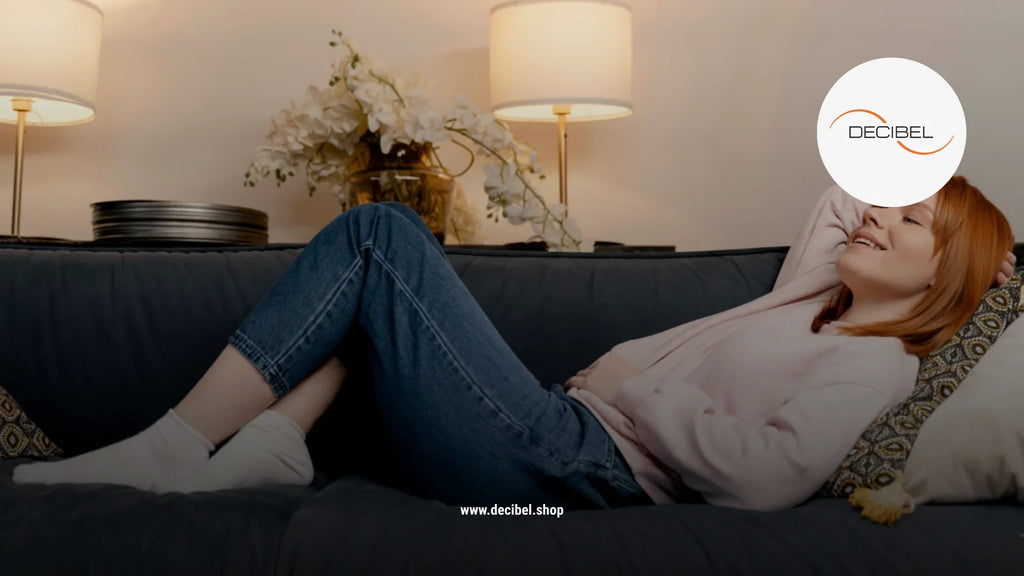 woman on a couch in acoustically treated home