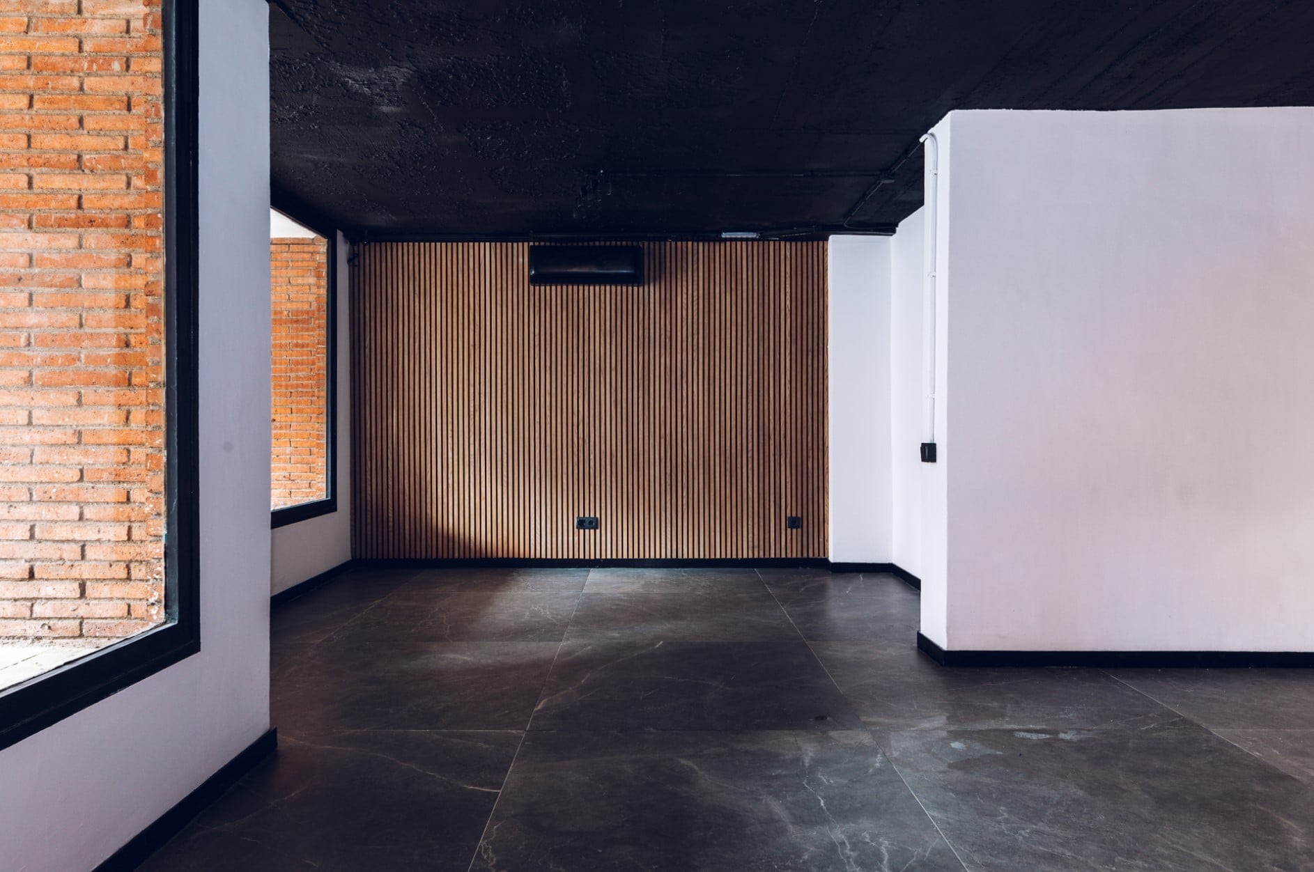 Eco-friendly wooden acoustic slat panels for multipurpose halls